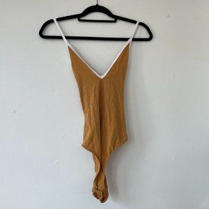 Yellow sporty body suit